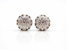 1 pair of earrings tested on 750 white gold with 14 diamonds, total approx. 1.0 ct, high purity