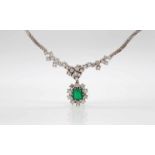 Necklace in 585 white gold with an emerald about 1.4 ct and 36 diamonds, total about 3.4 ct in