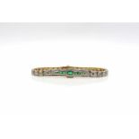 Bracelet made of 585 gold with 11 emeralds, total 1.2 ct and 164 octagonal cut diamonds ( 1