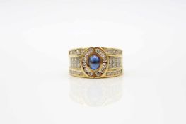 Ring made of 750 gold with a sapphire cabochon approx. 0.60 ct and diamonds, total approx. 0.80 ct