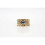 Ring made of 750 gold with a sapphire cabochon approx. 0.60 ct and diamonds, total approx. 0.80 ct