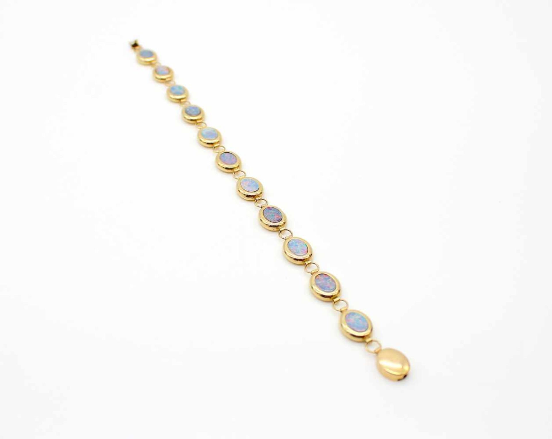 Bracelet made of 585 gold with 11 precious opals.weight 7,3 g, length approx. 18 cm Armband aus - Bild 2 aus 3