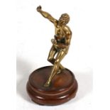 A bronze figure of a classical man, 15cms (6ins) high.