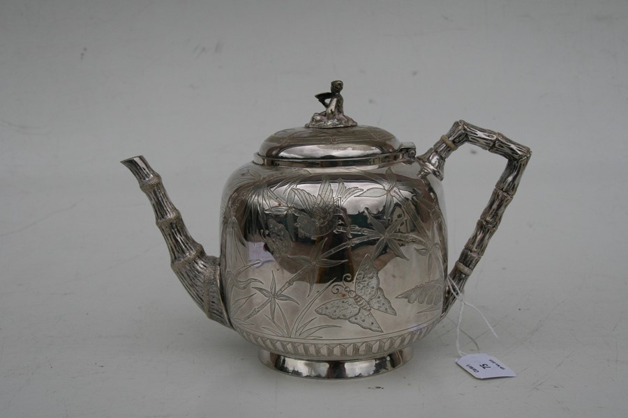 A Victorian silver plated Japanese manner teapot decorated with flowers, fans and insects, 17cms ( - Image 3 of 7