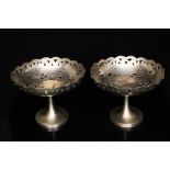 A pair of Chinese silver pierced bonbon dishes with engraved decoration, marked 'Zeewo', 9cms (3.