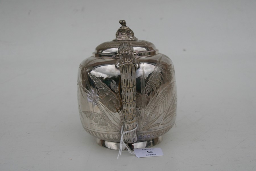 A Victorian silver plated Japanese manner teapot decorated with flowers, fans and insects, 17cms ( - Image 4 of 7