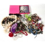A large quantity of costume jewellery, to include necklaces and bracelets.