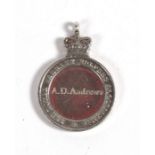 A full size 1989 hallmarked silver Royal Warrant Holders Association Medal named to A.D. Andrews