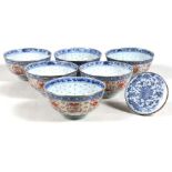 A Chinese silver mounted blue & white plaque decorated with flowers; together with a set of six