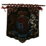 A Victorian bead work banner decorated with a coat of arms with a lion and a unicorn, 43cms (