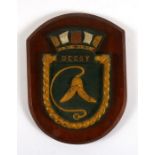 A hand painted bronze ships plaque or crest mounted on a wooden shield to HMS Decoy. 21cms (8.25ins)