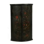 An early 19th century bowfronted wall hanging corner cupboard with chinoiserie decoration, 57cms (