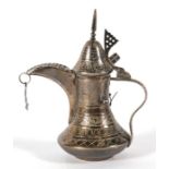 A miniature Turkish / Islamic silver dallah coffee pot, 9cms (3.5ins) high.