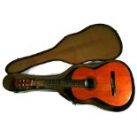 A Spanish acoustic guitar, spurious label for Miguel Angel, 97cms (38ins) long, cased.