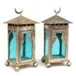 A pair of modern silver plated lanterns, 53cms (21ins) high.