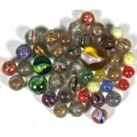 A quantity of Victorian and later marbles.