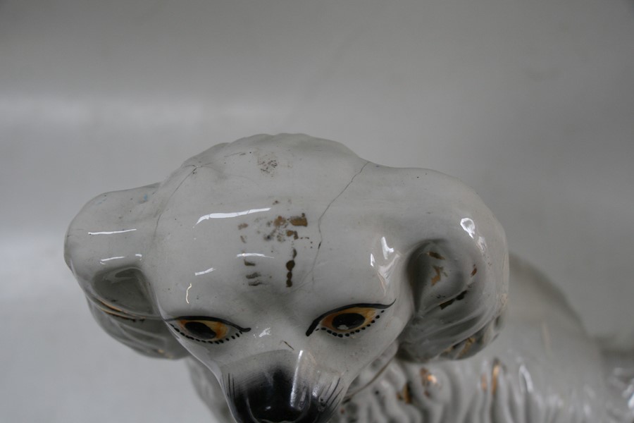 A pair of 19th century Staffordshire Spaniels, 36cms (14ins) high.Condition Report Hairline crack to - Image 4 of 5