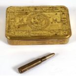 A WW1 Princess Mary tin together with a bullet pencil
