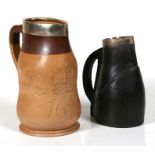 A Douton Stoneware model of a leather jack with silver rim, Chester 1903, 16.5cms (6.5ins) high;