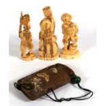 Three late 19th century Japanese carved ivory figure depicting peasants including a carpenter;