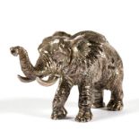 A miniature silver figure of an African bull elephant, London 2002, 4cms (1.5ins) high.Condition