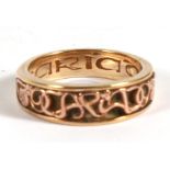 A 9ct gold Welsh Clogau ring, inscribed 'Cariad' (Love)', approx UK size 'N'.