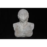 A weathered limestone two-faced Janus bust depicting an emaciated female (possibly a demon) with a