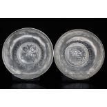 Two Russian or Eastern European white metal armorial bowls, 10.8cms (4.25ins) diameter (2).