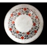 An Indian pietra dura charger decorated with a foliate border, 44cms (17.25ins) diameter.