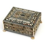 A 19th century Anglo-Indian Vizagapatam ivory and tortoiseshell casket, 12cms (4.75ins) wide.