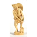 A late 19th century Japanese Tokyo school carved ivory figure depicting a peasant, two-character