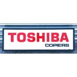A Toshiba advertising light box.