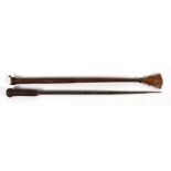 A plaited leather riding crop with concealed steel blade, the blade length 34cms (13.25ins), overall