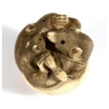 A late 19th century Japanese carved ivory group depicting three rats, with two character mark to the