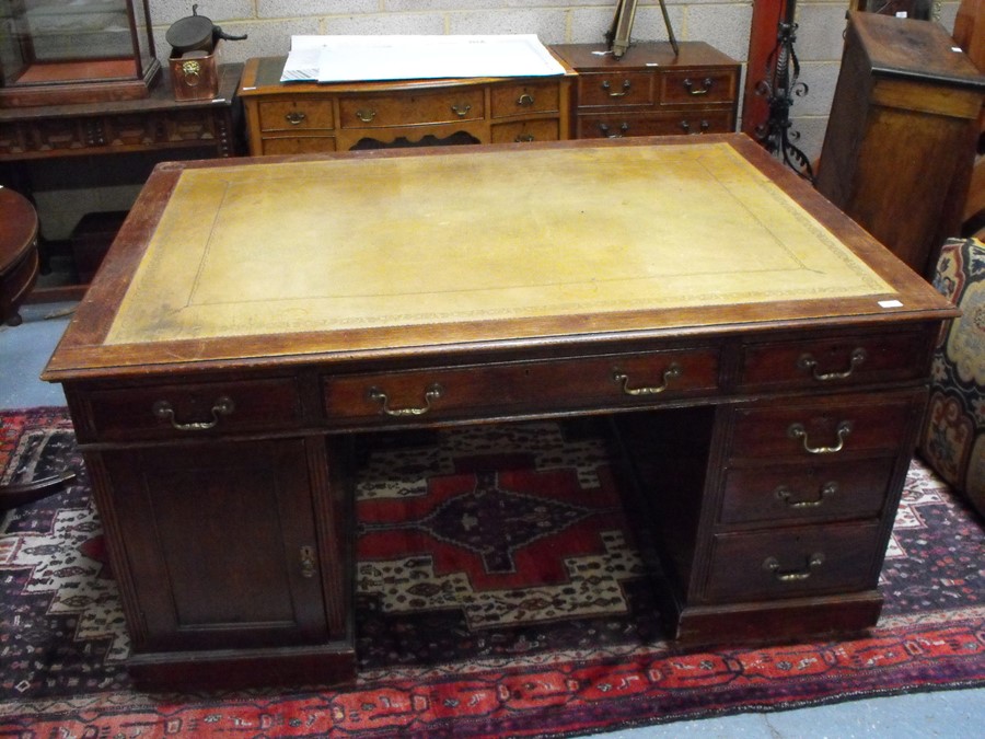 An early 20th century oak twin pedestal partner's desk, the top with green inset leather top, - Image 3 of 11