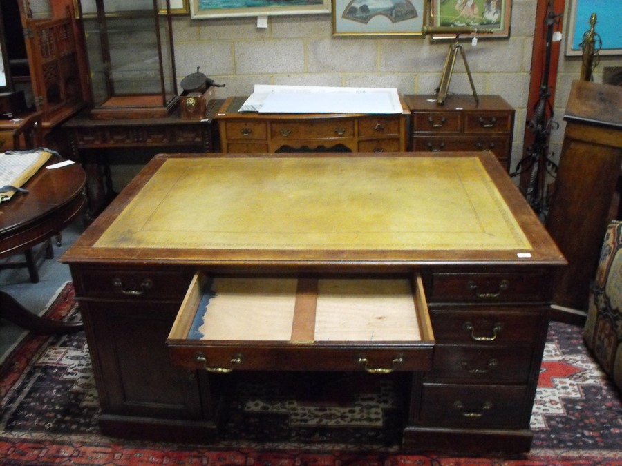 An early 20th century oak twin pedestal partner's desk, the top with green inset leather top, - Image 4 of 11