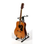 A Washburn model no. D10S acoustic guitar, serial no. SC01021173 and guitar stand (2).