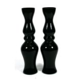 A pair of large black Art glass vases, 80cms (31.5ins) high.