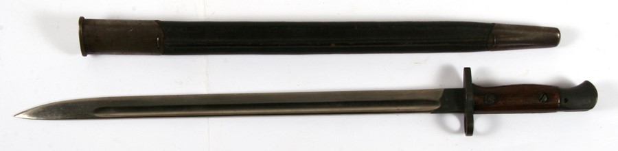 A rare 1907 pattern Lee Enfield sword bayonet manufactured by Chapman in its leather scabbard with - Image 2 of 4