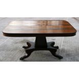 A Regency rosewood rectangular tilt-top dining table on tapering column and quatrefoil base, 150