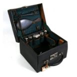 A Victorian gentleman's travel vanity case with silver mounted bottles, Birmingham 1898.Condition