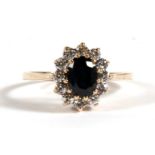 A 9ct gold sapphire cluster ring, approx UK size 'L'.