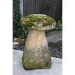 A staddle stone with mushroom top, 78cms (30.5ins) high.