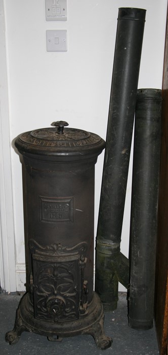 An early 20th century French cast iron wood burner, stamped 'Deville & Charleville, 1280', 88cms (