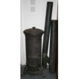 An early 20th century French cast iron wood burner, stamped 'Deville & Charleville, 1280', 88cms (