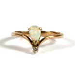 A 9ct gold opal and diamond ring, approx UK size 'L'. Full English hallmark for Sheffield 1980