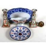 A pair of Chinese style famille rose candlesticks; together with a blue & white meat plate; and