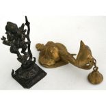 A Indian bronze temple figure depicting Ganesh, 19cms (7.5ins) high; together with a brass