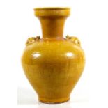 A Chinese yellow ground vase with sgraffito decoration, 6-character blue mark to underside, 30cms (