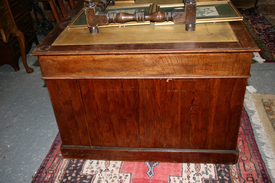 An early 20th century oak twin pedestal partner's desk, the top with green inset leather top, - Image 11 of 11